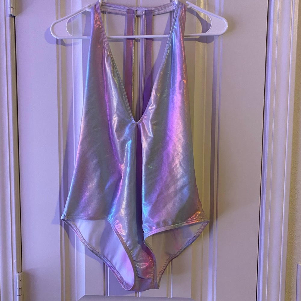 Out from under holographic body suit